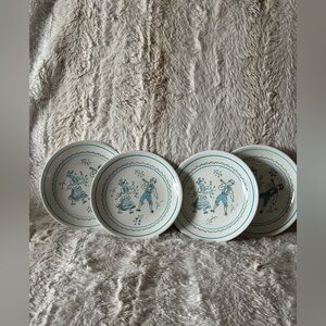 Four Vintage Blue and White Ceramic Plates